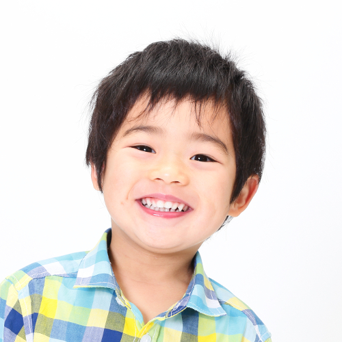 Child representing the restorative dentistry dental crowns service